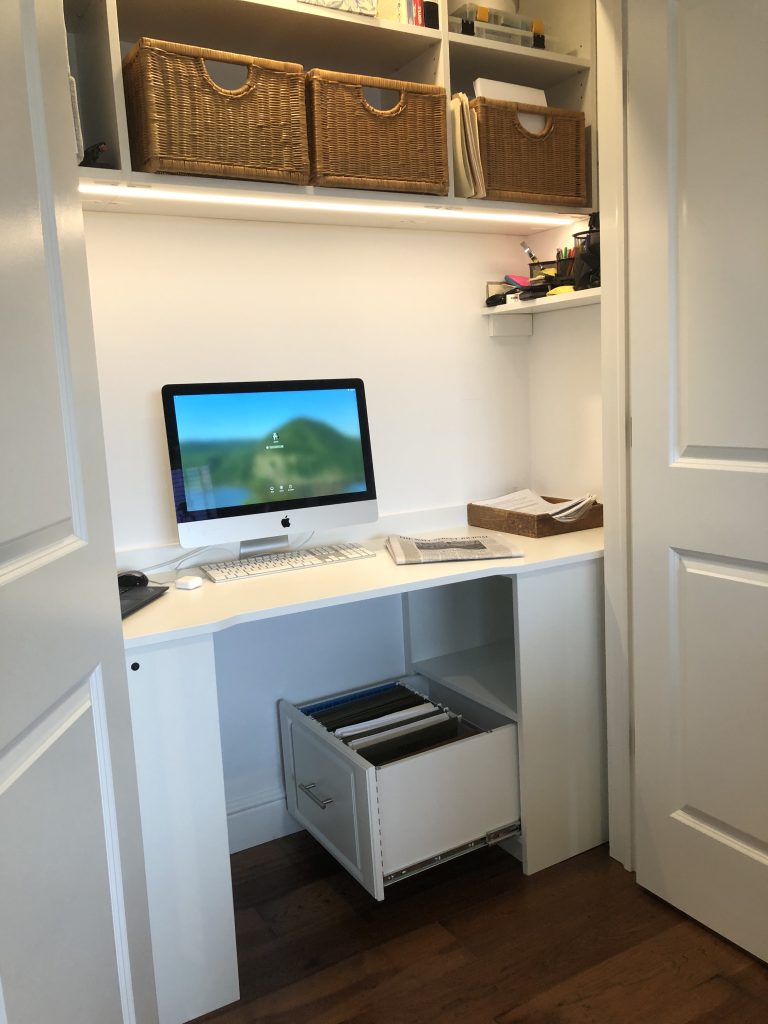 Close-up of pull-out hamper or modular shelving system